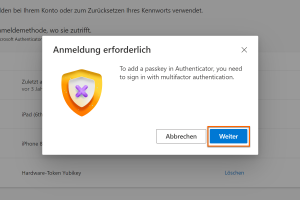 Screenshot der Microsoft-Konto-Sicherheitseinstellung. Ein Modalfenster fordert zur Bestätigung per Multi-Faktor-Authentifizierung auf, um einen Passkey hinzuzufügen. Die Schaltfläche "Weiter" ist markiert