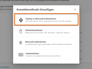 Modalfenster mit verschiedenen Optionen zur Erhöhung der Konto-Sicherheit.Neben dem Hauptschlüssel in der Microsoft Authenticator-App, die für diesen Case ausgewählt werden soll, stehen ein Sicherheitsschlüssel und eine Authenticator-App zur Verfügung.