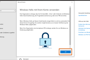 Pop-Up-Fenster, was auffordert Windows Hello mit Ihrem Konto zu verwenden. Ihre Organisation verlangt, dass Sie Ihr Geschäfts-, Schul- oder Unikonto mit Windows Hello Pin einrichten. Bestätigen Sie den Vorgang mit OK.